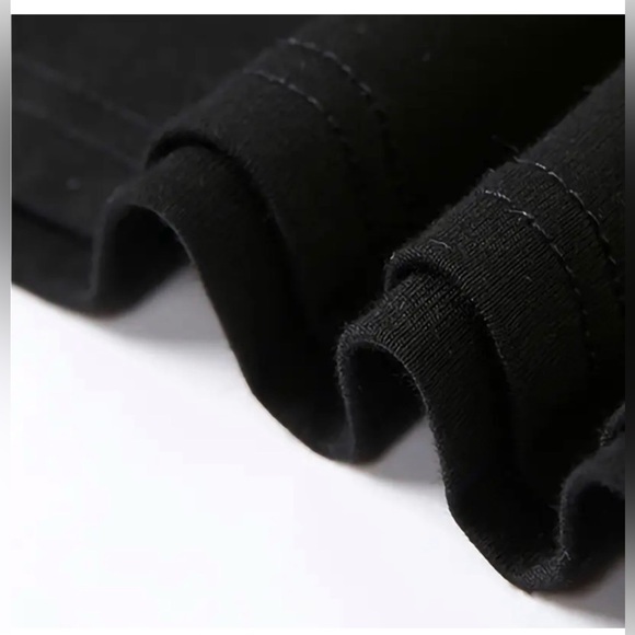 Chic Black Graphic Tee with Bold Text - Picture 3 of 5